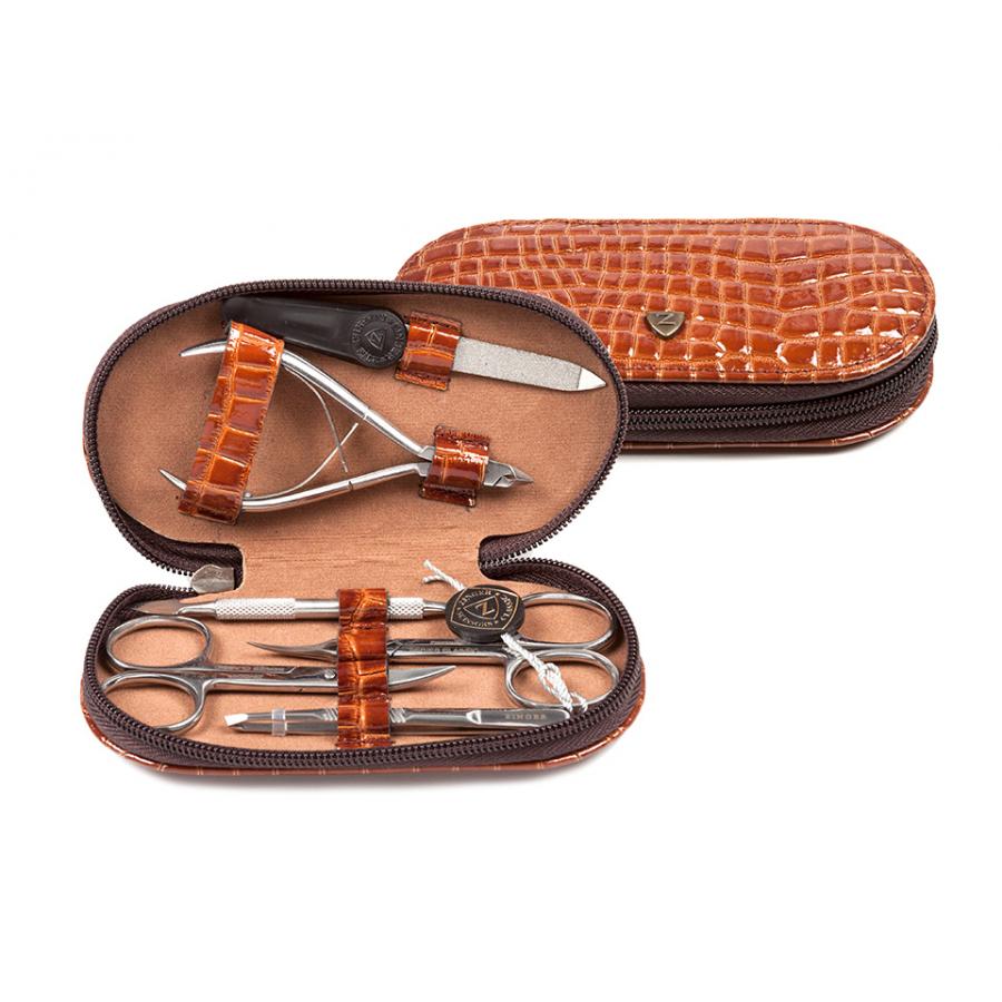 Маникюрный набор 6 предметов Zinger MS-7104-S коричневый
Маникюрный набор 6 предметов Zinger MS-7104-S коричневый