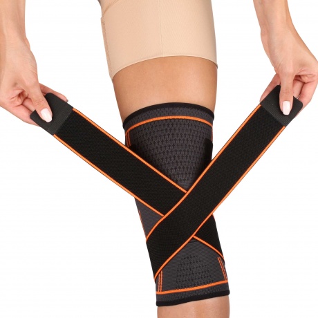 Суппорт колена эластичный INDIGO с компрессионными лямками  IN209 M Черно-оранжевый - фото 2
