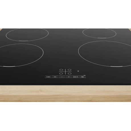 Индукционная варочная панель Bosch PUE611BB6E черная - фото 4